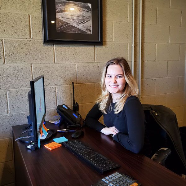 Kelly at her desk